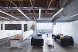 AB Design Studio transformed a warehouse into the headquarters of Forms + Surfaces in Carpinteria, California. 