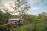 Exterior, Flat, Treehouse, Metal, and Metal The roof is standing-seam galvanized metal and the siding is Thermory driftwood.

  Exterior Flat Treehouse Photos from Escape to the Texan Treetops in This Eco-Luxe Treehouse
