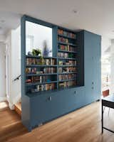 Megacabinet House staircase with bookshelf and storage