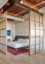 West Loop Loft bedroom with sliding doors