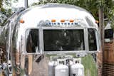Peanut is a 31-foot-long 1976 Airstream Land Yacht. Sitka Concept successfully restored the exterior to a mirror-like shine.