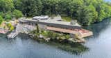 Fifty miles north of New York City, a private island with a controversial home and guesthouse built from Frank Lloyd Wright’s drawings seeks a new buyer.