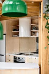 The kitchenette includes two Smeg cooktops (a ceramic electric and a stone grill) as well as a Qasair Albany suspended hood.