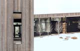 The exterior is clad in pre-finished inland cedar and shou sugi ban-charred wood.