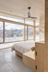 A peek inside the master bedroom that faces panoramic mountain views.