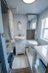 The compact bathroom includes a Nature's Head Compost Toilet. A high-powered exhaust fan, which Jilan considers a must-have for such a tiny house, helps eliminates bathroom smells. 