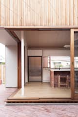 Glazed sliding doors blur the lines between indoor and outdoor living and help bring in cooling cross breezes from the coast. 