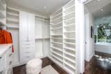 A peek into the walk-in closet next to the master bath.