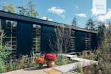 Metal structural insulated panels (SIPs) informed the rectangular shape of the home. "Every single surface of the home could be cut out of a flat rectangle," says Hygge Supply founder Sean Karcher.