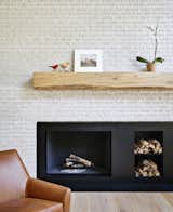 The fireplace mantel was crafted from an oak tree felled on the property. 
