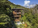 Built entirely from teak harvested on-site, this breezy solar-powered home in Santa Teresa, Costa Rica, ticks all the right boxes for a pair of avid environmentalists who love surfing. 