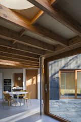 "Having made the decision to have exposed Douglas fir ceiling joists, resolving the geometry of the structure over the main, non-orthogonal living area presented an interesting headache that took a while to figure out, particularly given the need also to accommodate two circular roof lights," notes Pile. 