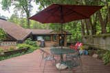 The sunroom connects to a deck for entertaining. 