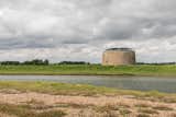 Exterior, House Building Type, and Brick Siding Material Located in an Area of Outstanding Nature Beauty in the secluded village of Bawdsey, the Martello Tower Y overlooks views of the sea and countryside.  Photo 1 of 16 in Own a Brilliantly Converted Brick Fortress in England For $1.5M