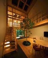 The House in Kyoto illuminated with select lighting at night. 