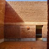 Locally sourced brick is one of Casa Terreno's main building materials. Broken bricks have also been used with the rough side exposed to create highly textured wall surfaces. 