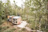 In Finland, two students with little experience but a lot of gumption design a minimalist home in the woods and build most of it—from the roofing to the stovepipes—on their own.