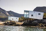 The cabins had to be built a certain height above the water to protect against high tide and predicted sea level rise. The structures are elevated on iron rods drilled into the rock and anchored with steel reclaimed from the island.