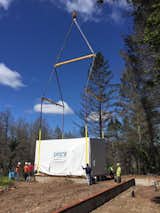 In Santa Rosa, Plant Prefab installed a modular home for victims of the Tubbs fire. Here, a module is craned onto the site.