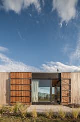 The shutters can be opened to allow views and cross breezes through the building. 
