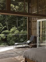 "I love the relationship of the upper bedroom to the northern view into the bush," says Gittos. "You can open this room right up, and it feels like you are sleeping in the tree canopy."