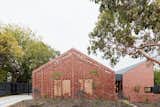 Recycled Red Brick Wraps Two Affordable Rental Homes in Australia