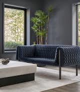 The modern renovation is largely the work of local firm Reigo &amp; Bauer, who incorporated bright colors and sculptural forms to reshape the home.&nbsp;Their love of highly textured fabrics is evident in their selection of diverse furnishings.