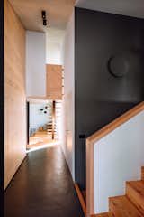 Dark gray accents provide contrast to the predominate use of larch and pine inside the home.