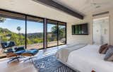 Bedroom, Bed, Recessed Lighting, and Light Hardwood Floor The master suite on the upper level opens up to a private outdoor deck.   Photo 6 of 15 in Will Arnett Lists His Prefab-Hybrid Home in Beverly Hills for $11M