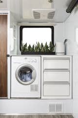 An optional washer/dryer combo unit can be added next to the three-drawer dresser.&nbsp;