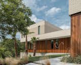 Exterior, Brick Siding Material, House Building Type, and Wood Siding Material  Photo 1 of 9 in 9 Stunning New Homes in Austin Will Open Their Doors for a Virtual Tour