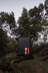 The retreat has a pine-framed structure, with polyester insulation sandwiched between the plywood interior and cladding.