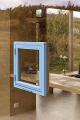 The "practically maintenance-free" window frames are built of untreated heartwood. 