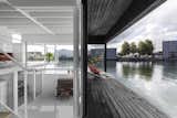 An Off-Grid Floating Home Brings the All-Black Aesthetic to the Canals of Amsterdam - Photo 5 of 21 - 