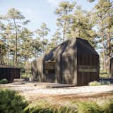 Exterior, Prefab Building Type, Cabin Building Type, and Wood Siding Material Each Hytte will be clad in shou sugi ban-treated larch to recede the buildings into the landscape.  Photos from These New Prefab Cabins Provide Hoteliers With Sleek, Scalable Accommodations