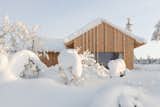 After years of working at Oslo- and San Francisco–based Mork Ulnes Architects, Norwegian architect Erling Berg launched his own practice—and his first project was a cozy cabin in Norway’s Kvitfjell ski area with a minimalist, Scandinavian aesthetic and an eco-sensitive design. The cabin is clad in untreated, locally sourced pine that will develop a silvery-gray patina over time.