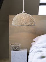 The LOKALT baskets and lampshades are handcrafted from banana bark fibers, a waste by-product from banana farming. 