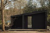 UK-based Koto developed prefab cabins for Fritton Lake, a private holiday club situated in the heart of a 1,000-acre rewilding project in England. Koto combines design influences from Scandinavia and Japan to create minimalist and modern cabins that blend into the landscape.