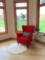 Living Room, Chair, Pendant Lighting, and Medium Hardwood Floor  Photo 8 of 16 in Modern Craftsman Style Home by La Bar Properties, Inc