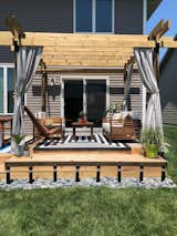 Outdoor, Back Yard, Decking Patio, Porch, Deck, Large Patio, Porch, Deck, Grass, Landscape Lighting, and Stone Patio, Porch, Deck Cabana Living  Photo 1 of 2 in Cabana living in the Midwest by La Bar Properties, Inc