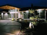 Landscape lighting illuminates key features of the landscape at night.  Photo 7 of 11 in Elevation Landscape Design & Build by Ross NW Watergardens