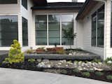 The dry garden contains a custom copper basin fountain and planters.  Photo 8 of 11 in Elevation Landscape Design & Build by Ross NW Watergardens