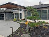 Black and shore pines are key focal points in the front yard.  Photo 4 of 11 in Elevation Landscape Design & Build by Ross NW Watergardens