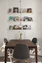 kitchen table and book rack filled with cookbooks