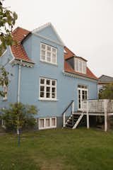 Exterior, House Building Type, Shingles Roof Material, and Brick Siding Material This lovely blue Copenhagen home is a short walk from the sea.  Photo 1 of 19 in Colorful & Eclectic Danish Home by Petra Ford