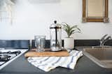 The earth toned kitchen is simple but sweet