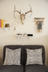 Another cool and cozy nook, featuring a vintage skull and wool wall hanging