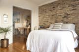 A small alcove leads into the living area from the kitchen