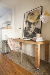 A portrait of Hunter S. Thompson signed by both the artist and HST sits atop the wooden desk in the alcove