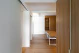 Dining Room, Chair, Table, Medium Hardwood Floor, and Wall Lighting Dining room  Photo 15 of 20 in CM House by EXiT architetti associati